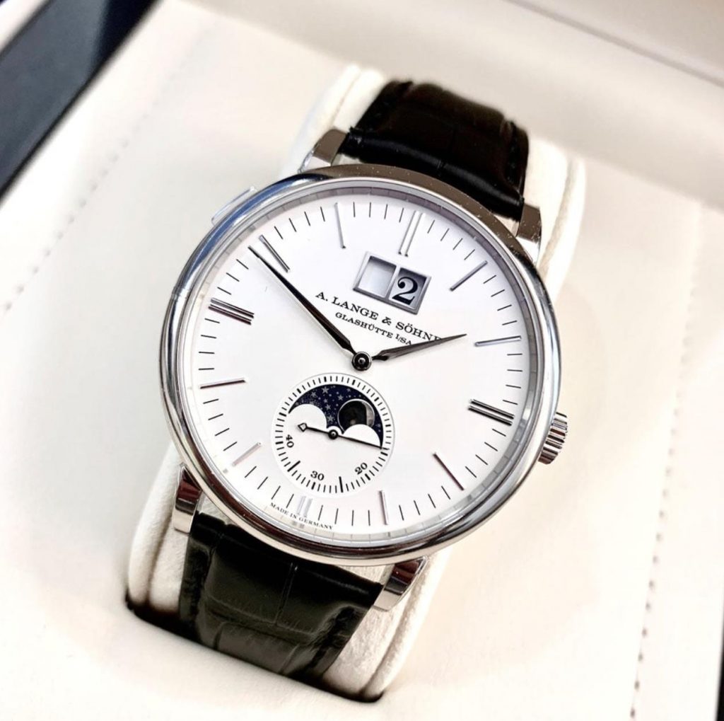 The 18k white gold fake watch has a moon phase.